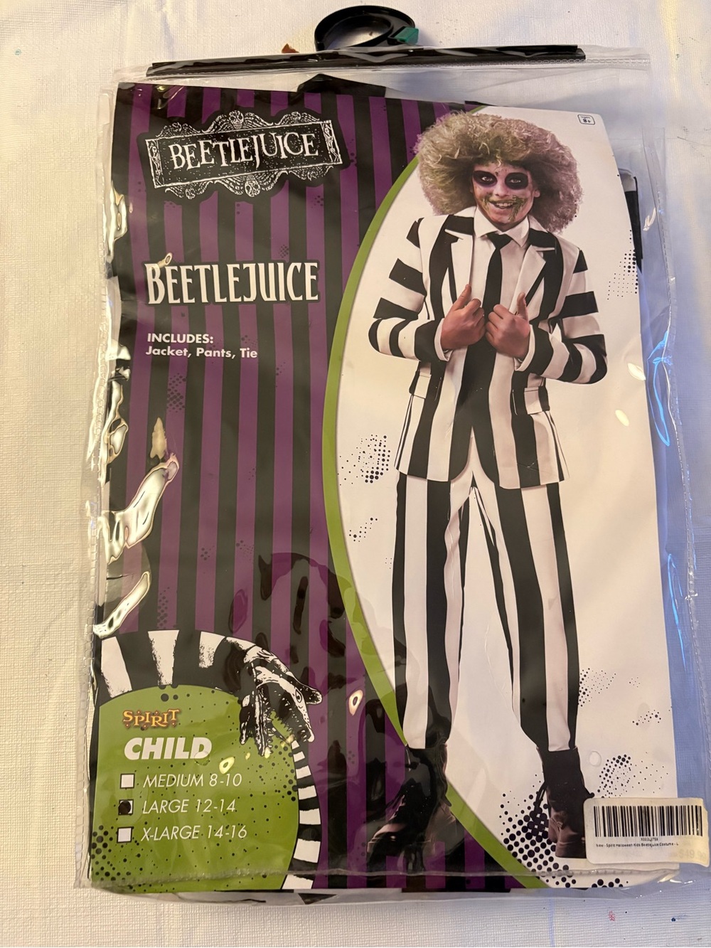 New in bag Kids Beetlejuice Costume, size large (12-14)